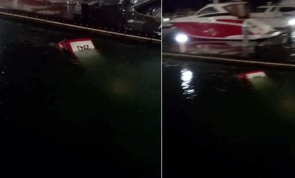 Taxi cae al mar en Veracruz