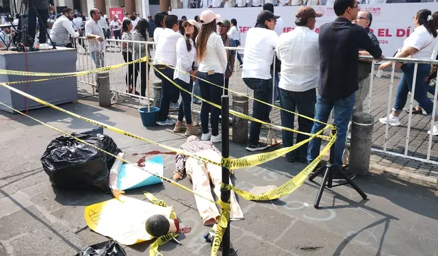 Familias de periodistas asesinados exigen justicia en desfile del Trabajo