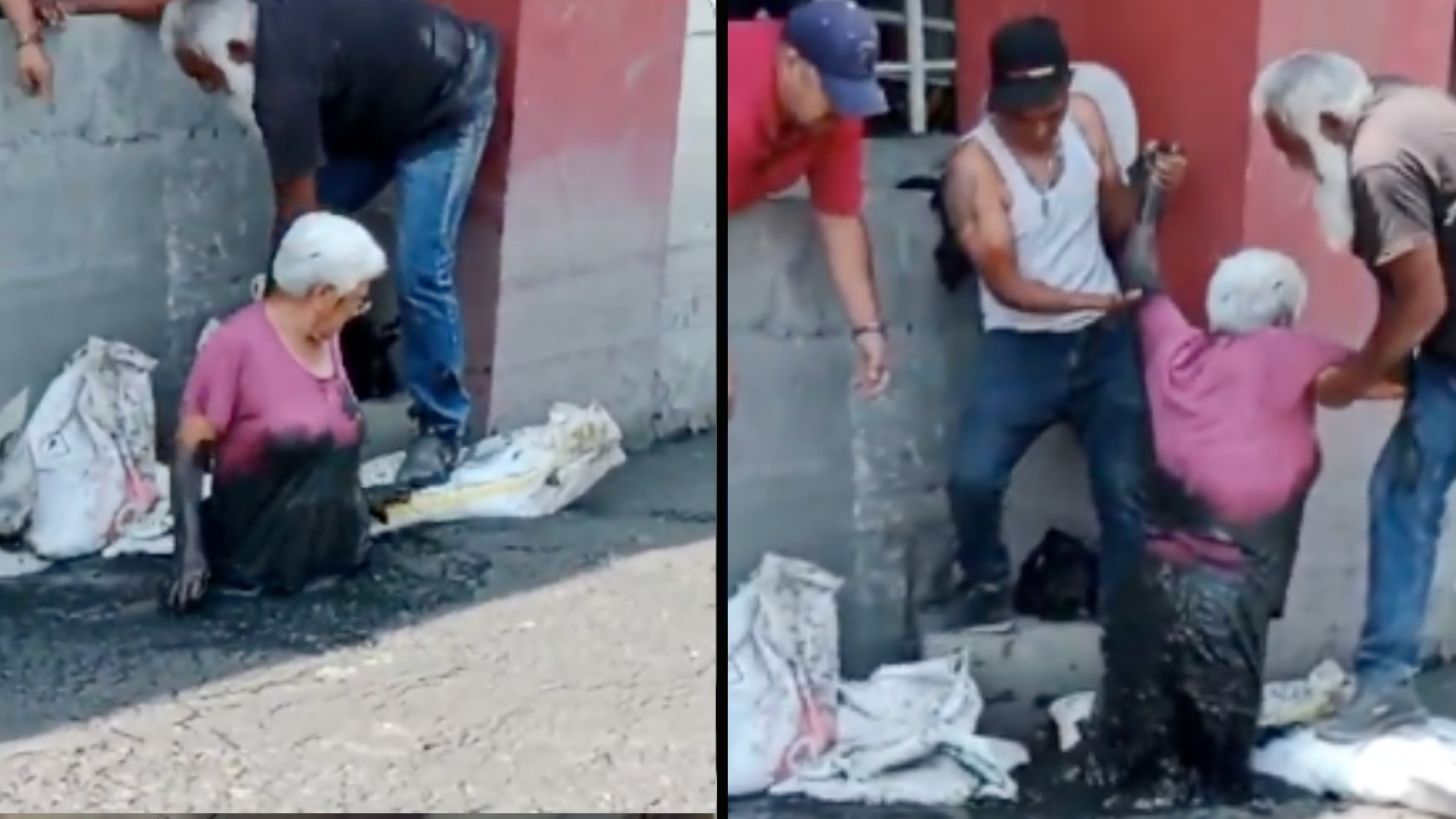 Mujer queda atrapada bajo coladera tras intensas lluvias, pobladores lograron rescatarla